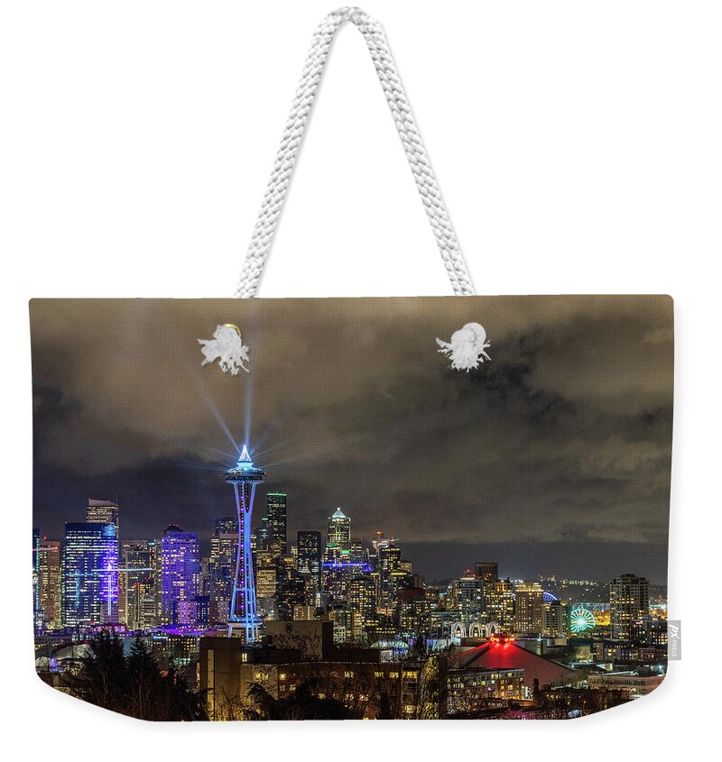 Seattle Weekender Tote Bag featuring the photograph The Star of Seattle by Bryan Xavier