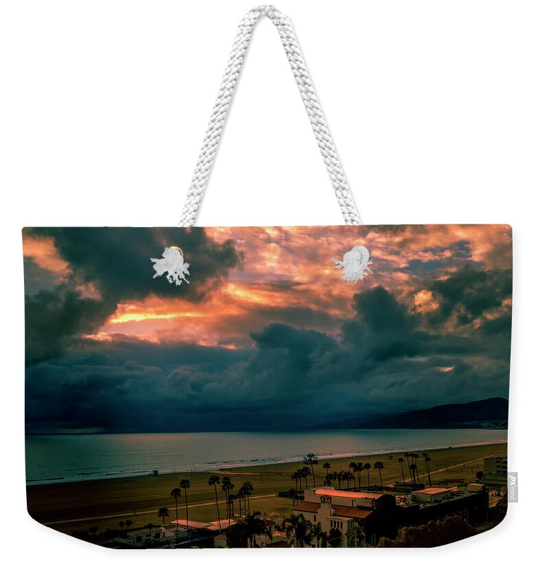 Malibu Sunset Weekender Tote Bag featuring the photograph The Storm Moves On by Gene Parks
