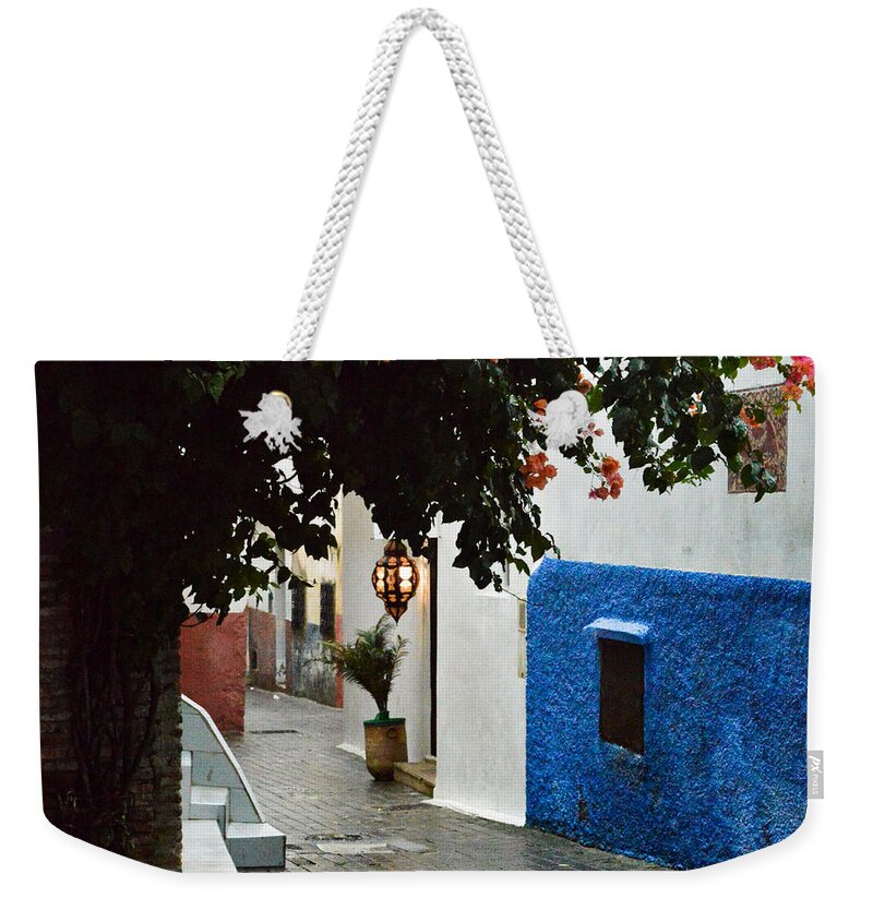 Tangier Weekender Tote Bag featuring the photograph The streets of Tangier by Yavor Mihaylov