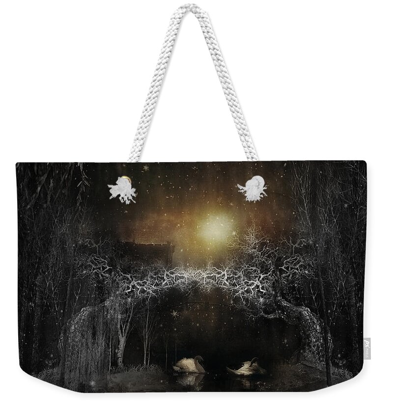  Weekender Tote Bag featuring the photograph The swans by Cybele Moon