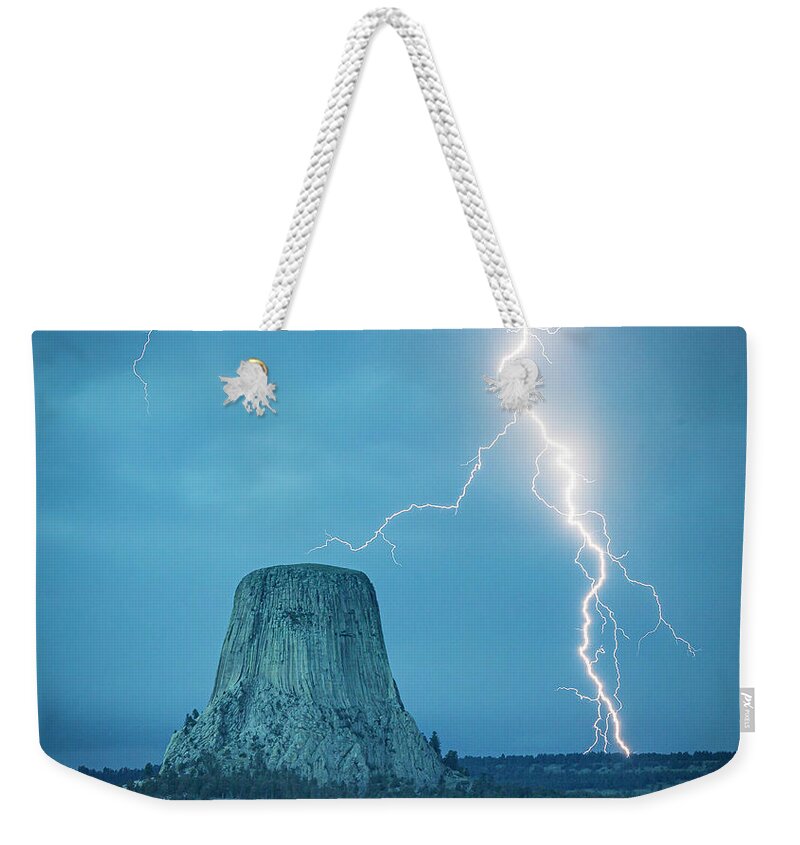 Devils Tower Weekender Tote Bag featuring the photograph The Tower by Laura Hedien
