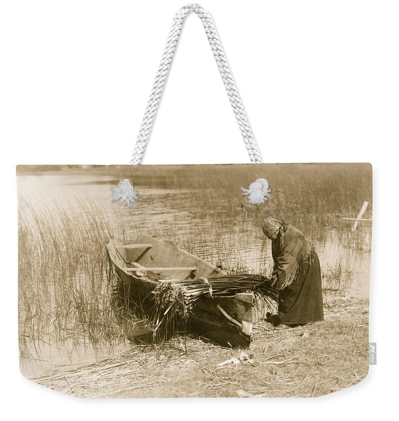 Indian Weekender Tote Bag featuring the painting The tule gatherer by 