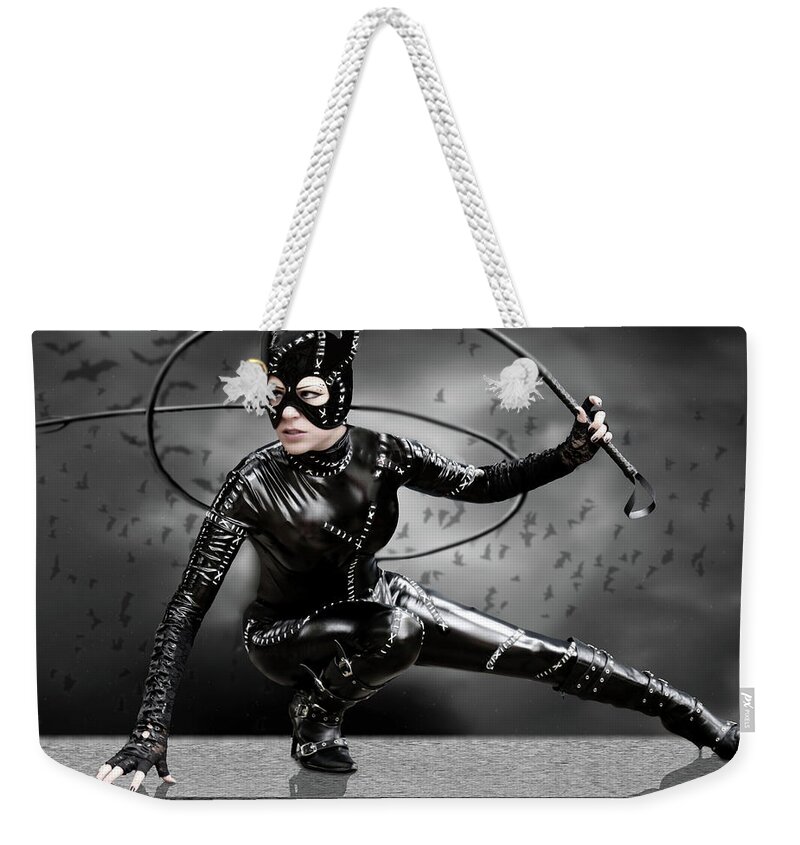 Cat Weekender Tote Bag featuring the photograph The Whip Of The Cat Woman by Jon Volden