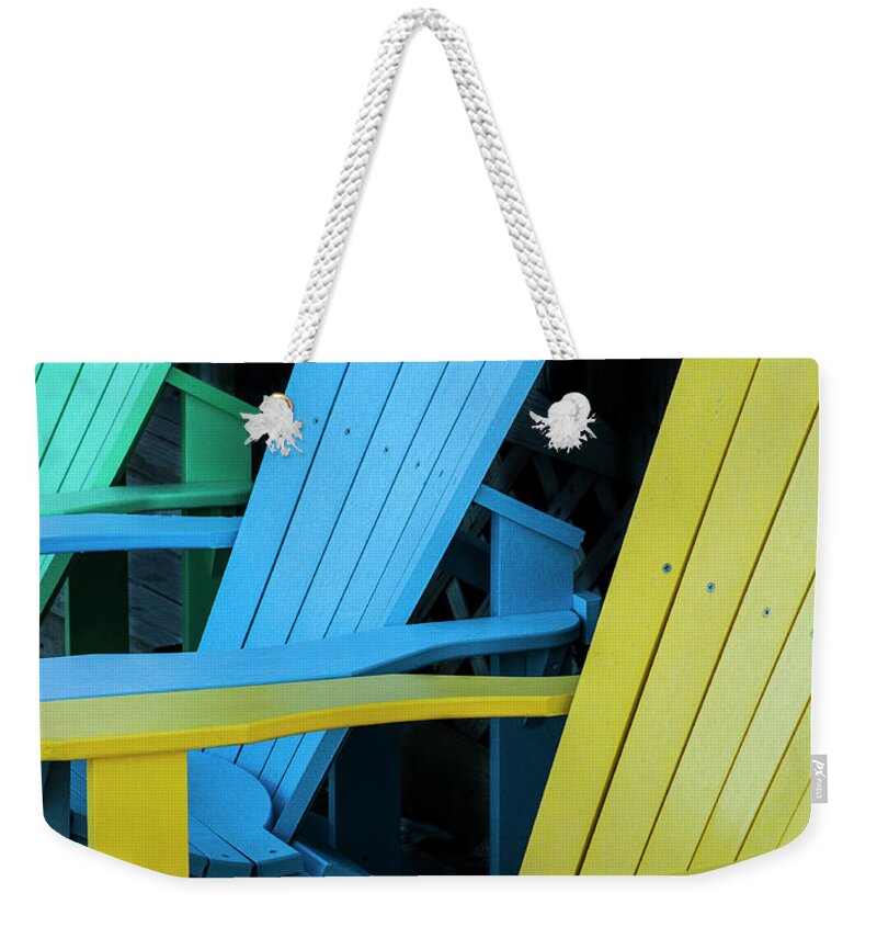 Graphics Weekender Tote Bag featuring the photograph Three Adirondack Chairs by Ginger Stein