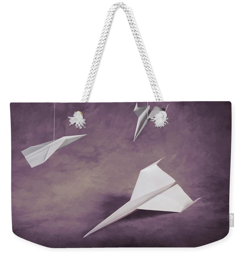 Airplane Weekender Tote Bag featuring the photograph Three Paper Airplanes by Tom Mc Nemar