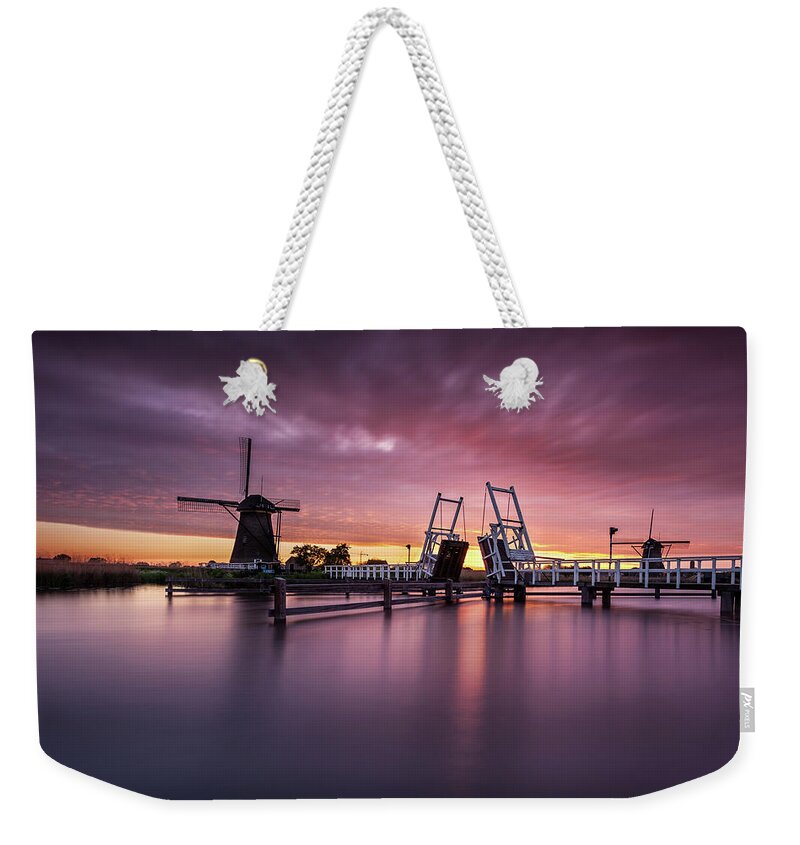 Kinderdjik Weekender Tote Bag featuring the photograph Time lord by Jorge Maia
