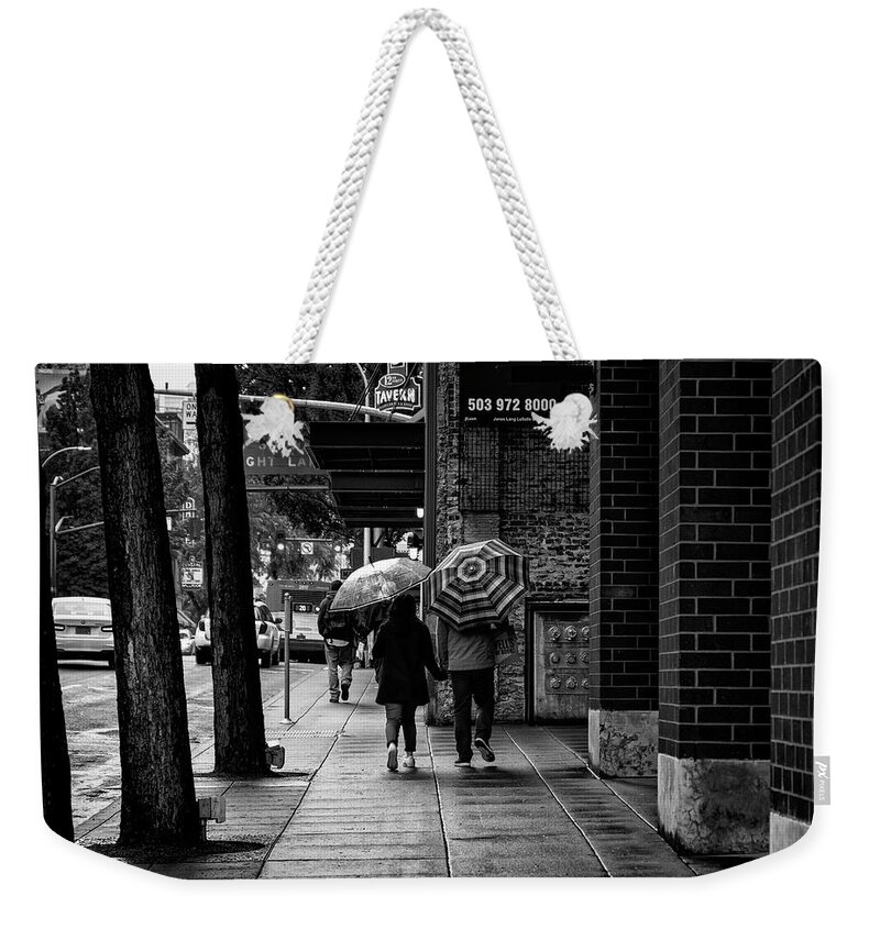People Weekender Tote Bag featuring the photograph Together Rain or Shine by Steven Clark