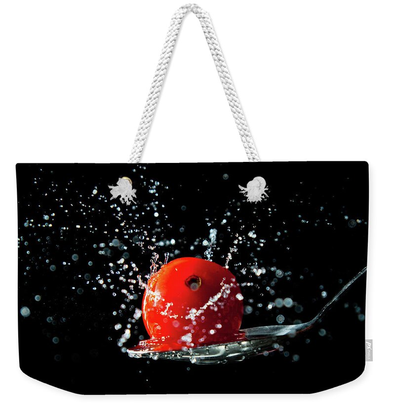 Spoon Weekender Tote Bag featuring the photograph Tomato Splash by Rob Webb