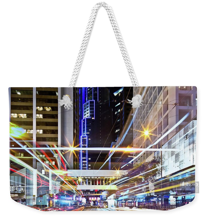 Crisscross Weekender Tote Bag featuring the photograph Traffic Trails In Hong Kong by Andi Andreas