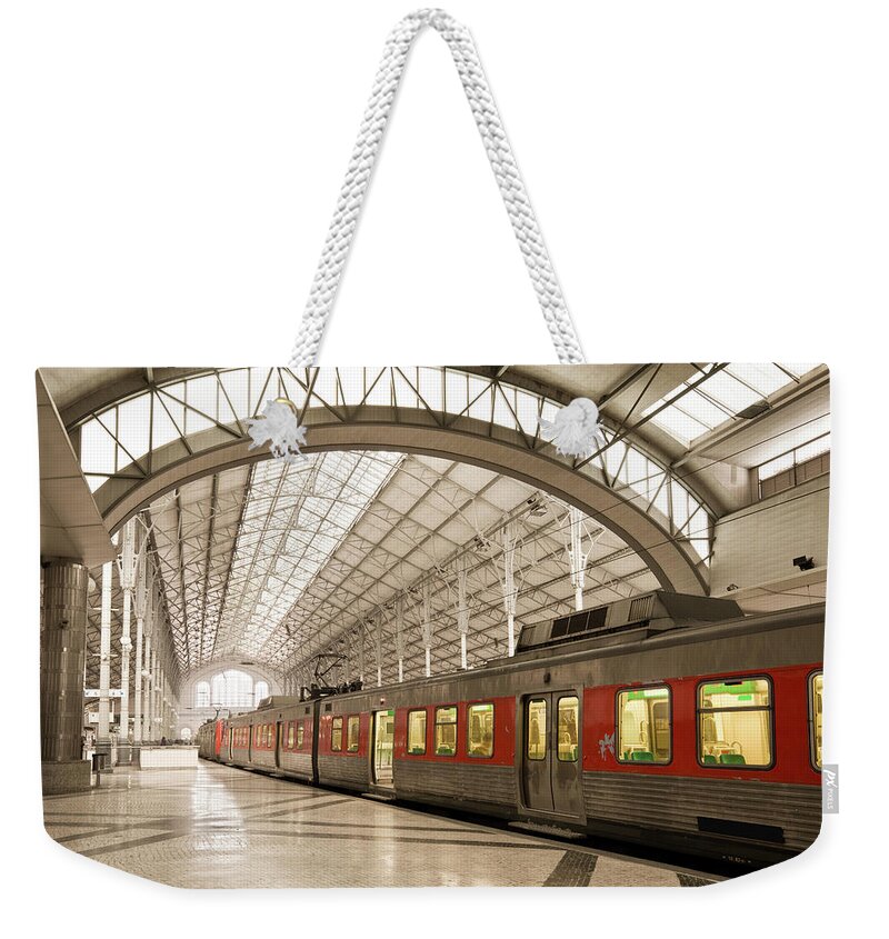 Passenger Train Weekender Tote Bag featuring the photograph Train And Railroad Station by Benedek