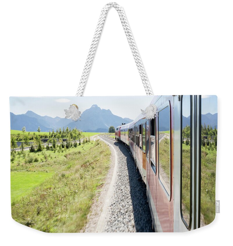 Train Weekender Tote Bag featuring the photograph Train In German Alps by Grandriver