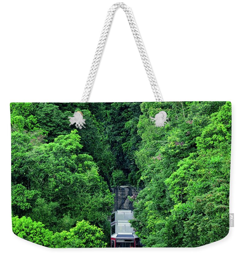 Train Weekender Tote Bag featuring the photograph Train Passing Forest by Jacky Lee