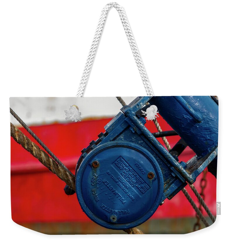 Pulley Weekender Tote Bag featuring the photograph Troller Pullmaster Winch by Susan Candelario