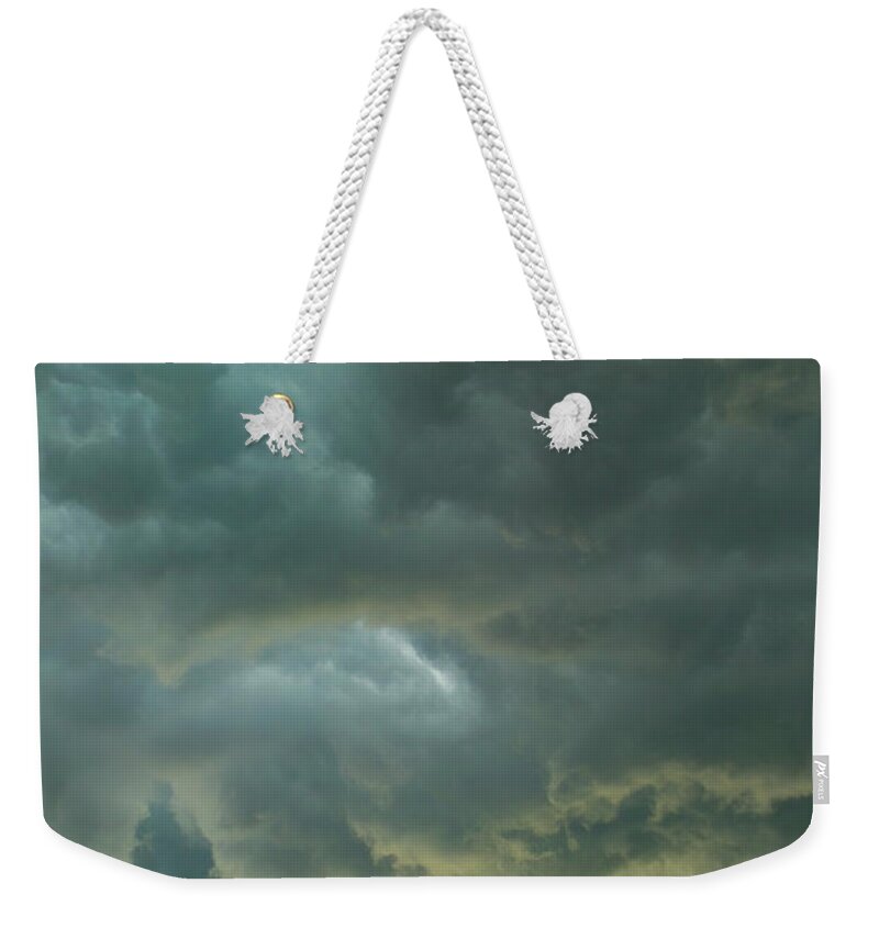 Wind Weekender Tote Bag featuring the photograph Tropical Storm Clods by Rodkosmos