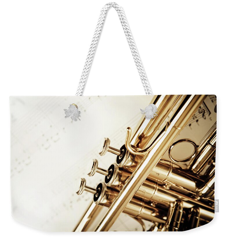 Music Weekender Tote Bag featuring the photograph Trumpet And Notes by Aleksandarnakic