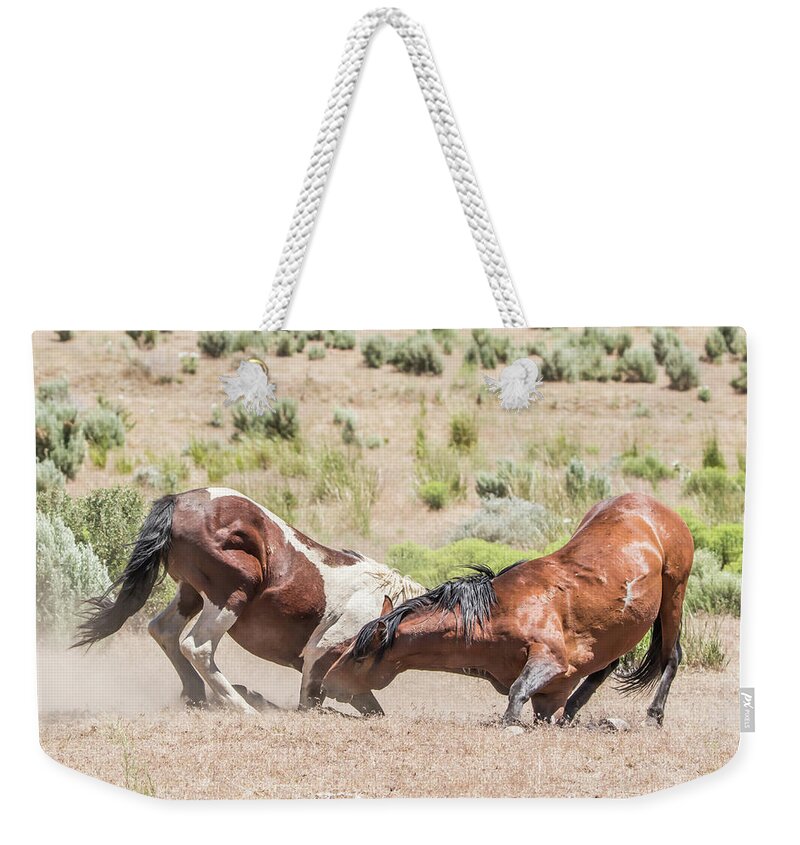 Nevada Weekender Tote Bag featuring the photograph Trying a Different Move by Marc Crumpler