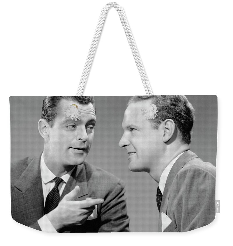 People Weekender Tote Bag featuring the photograph Two Businessmen In Meeting by George Marks