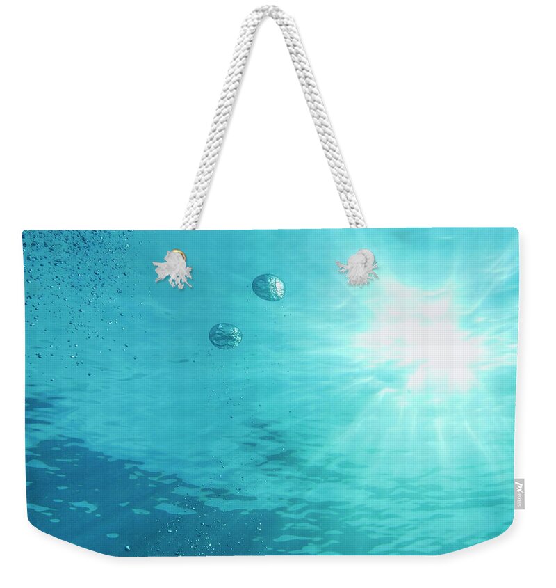 Underwater Weekender Tote Bag featuring the photograph Underwater Sunbeams And Bubbles by Jodijacobson