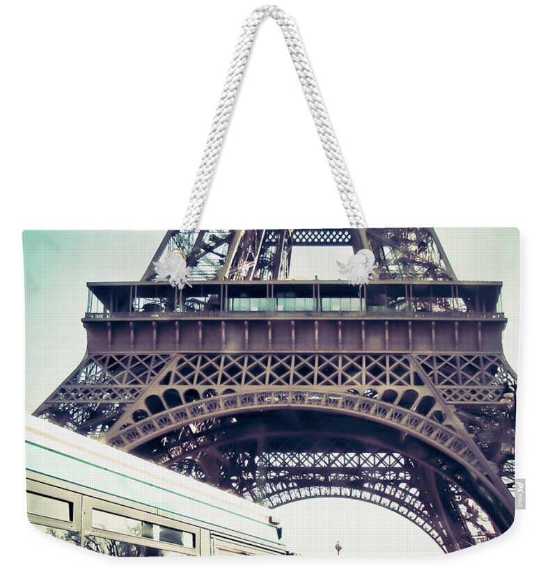 Arch Weekender Tote Bag featuring the photograph Urban Lifestyle At The Tour Eiffel In by Federica Fortunat