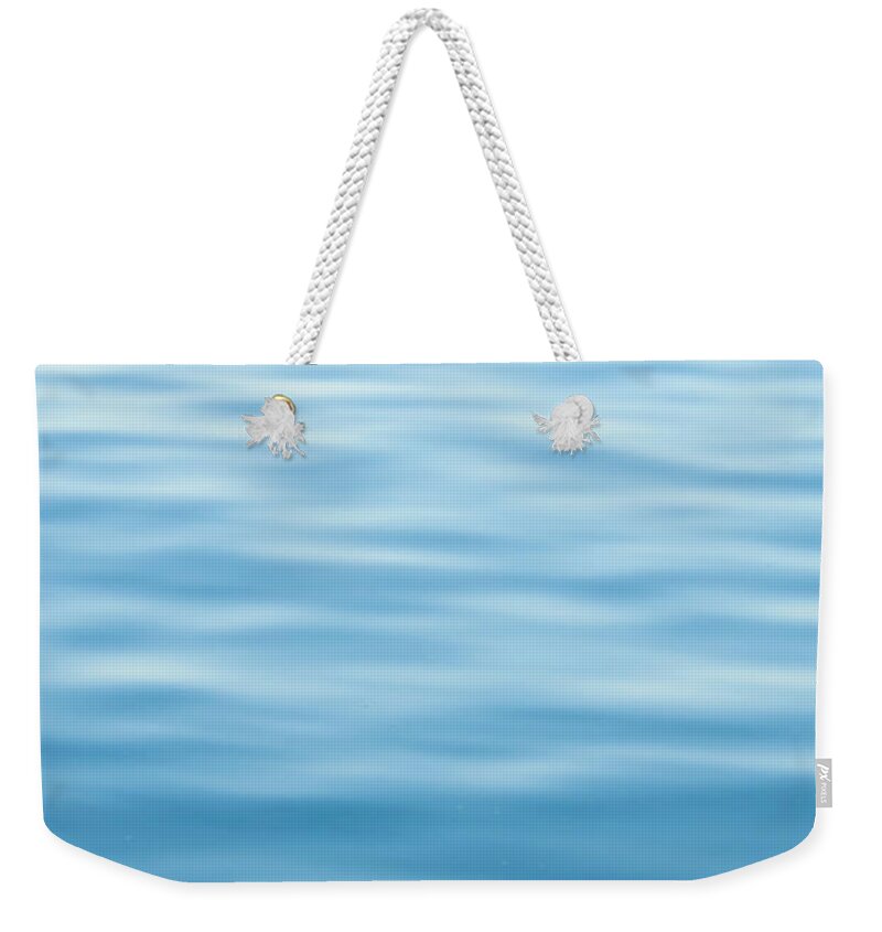 Head Above Water Weekender Tote Bag featuring the photograph Vertical View Of The Open Sea In by Digiclicks