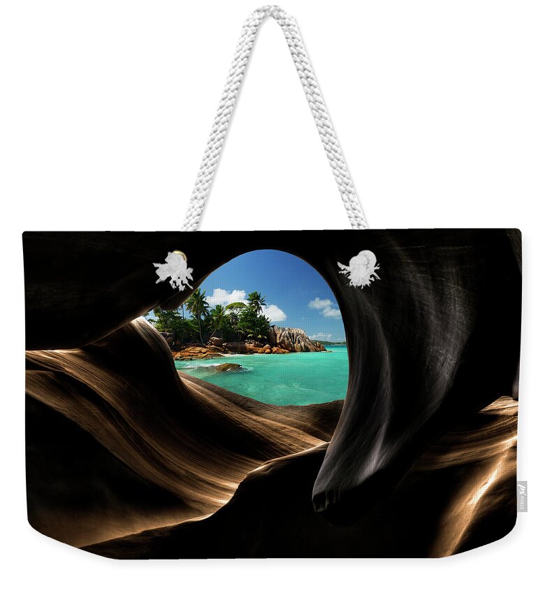 Cave Weekender Tote Bag featuring the photograph View From A Cave by Wolfgang steiner