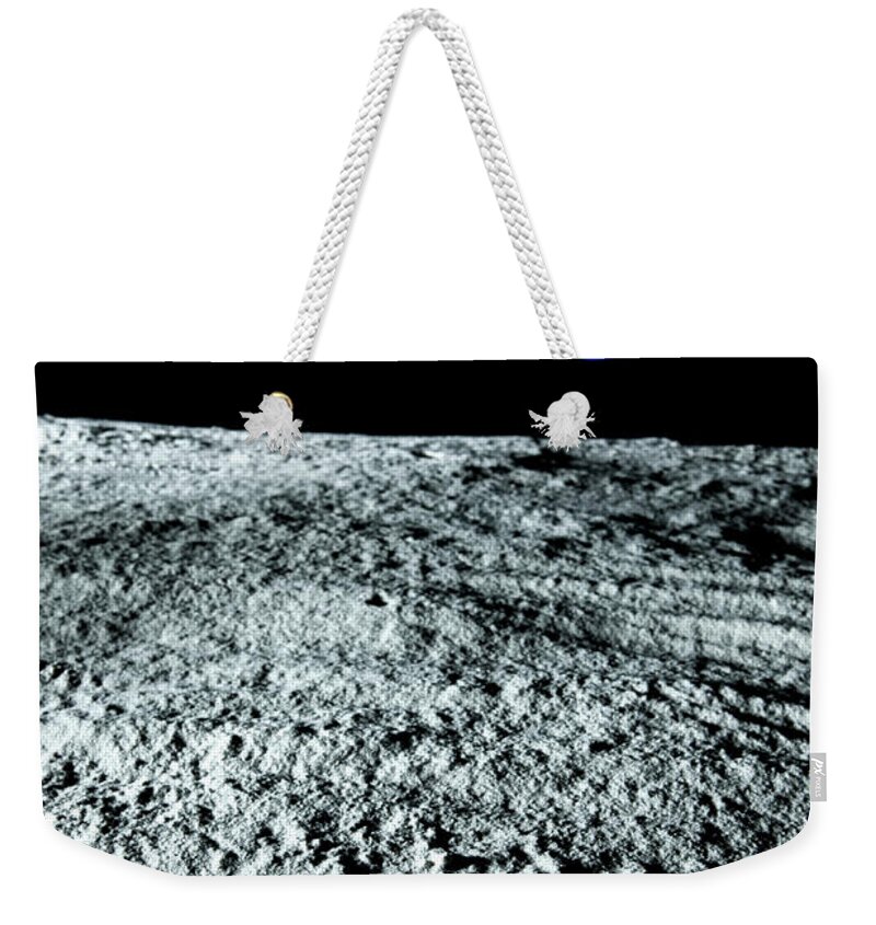 Textured Weekender Tote Bag featuring the photograph View Of Earth From The Moon by Caspar Benson