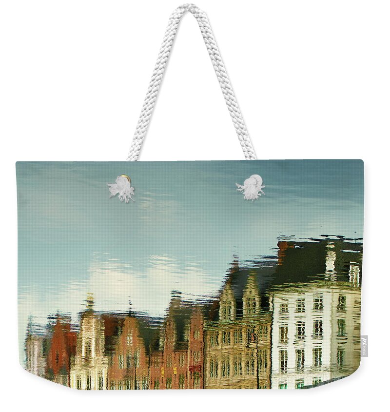 Belgium Weekender Tote Bag featuring the photograph View Of Ghent Reflection In Water by Elisabeth Schmitt