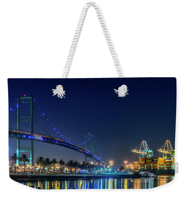 Vincent Thomas Gantry Cranes Lit At Night Weekender Tote Bag featuring the photograph Vincent Thomas Gantry Cranes Lit at Night by David Zanzinger