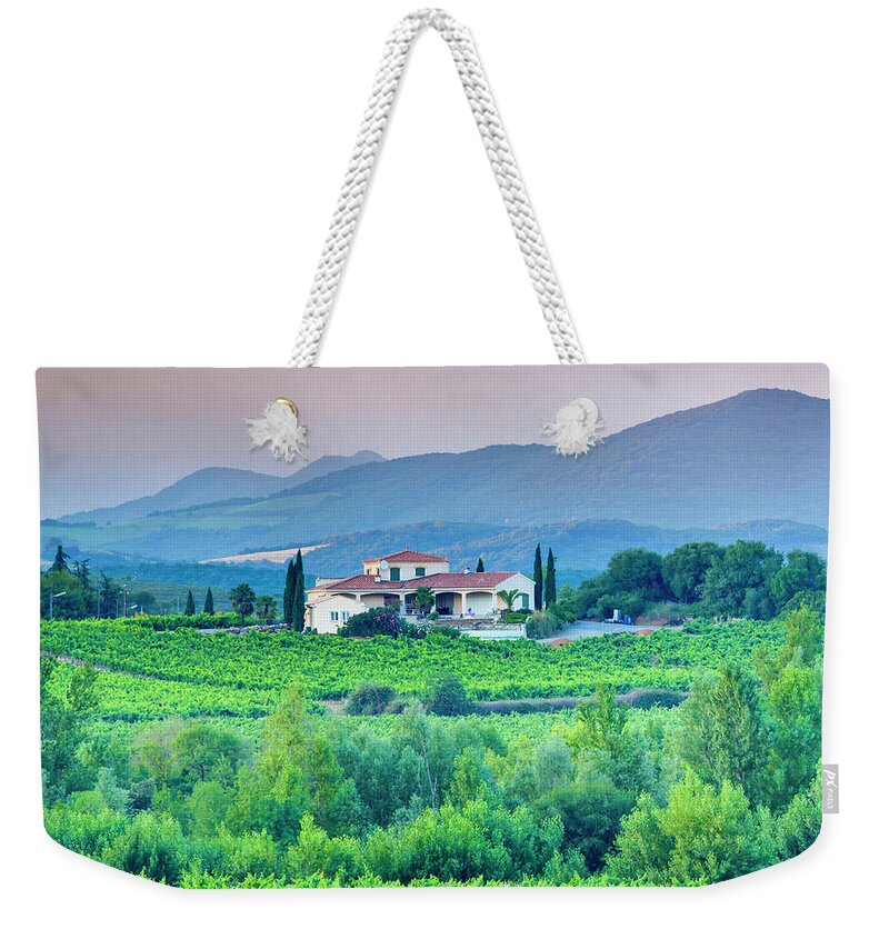 Season Weekender Tote Bag featuring the photograph Vineyard, Villa And Rolling Hills In by Espiegle