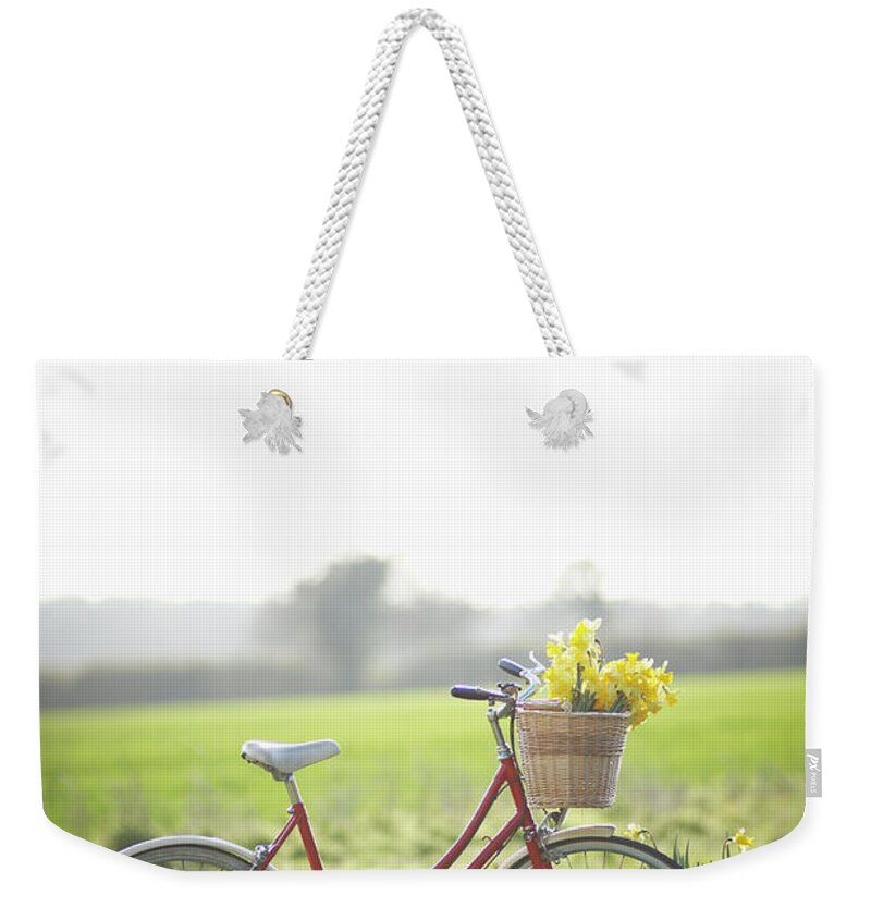 Outdoors Weekender Tote Bag featuring the photograph Vintage Bike In Countryside With Fresh by Dougal Waters