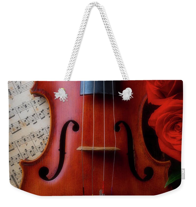 Old Weekender Tote Bag featuring the photograph Violin And Two Red Roses by Garry Gay