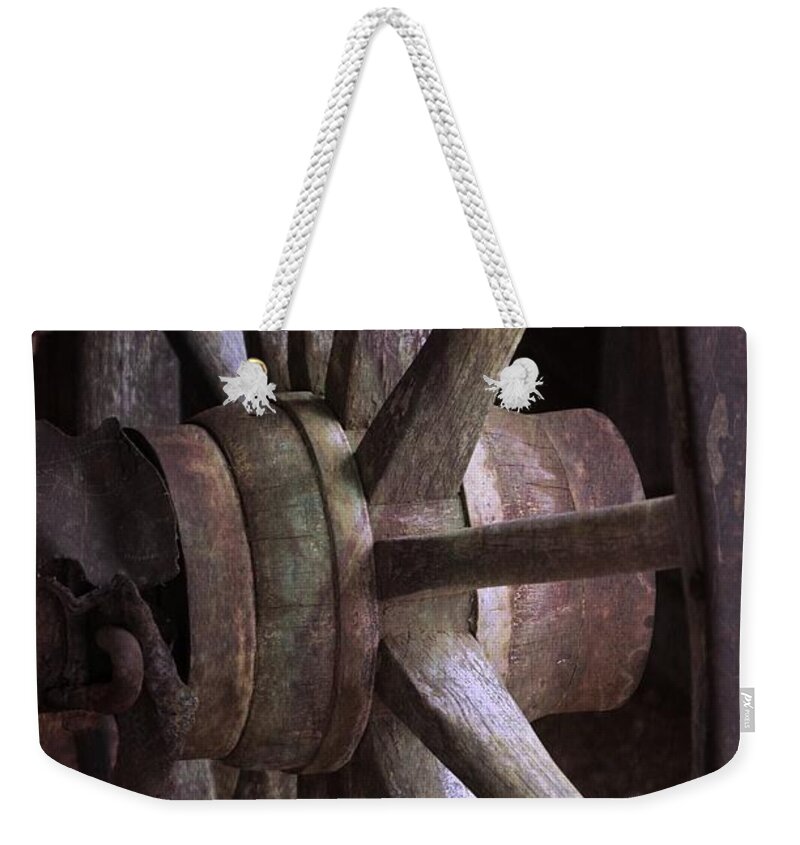 Wagon Wheel Weekender Tote Bag featuring the photograph Wagon Wheel by Robert Meanor