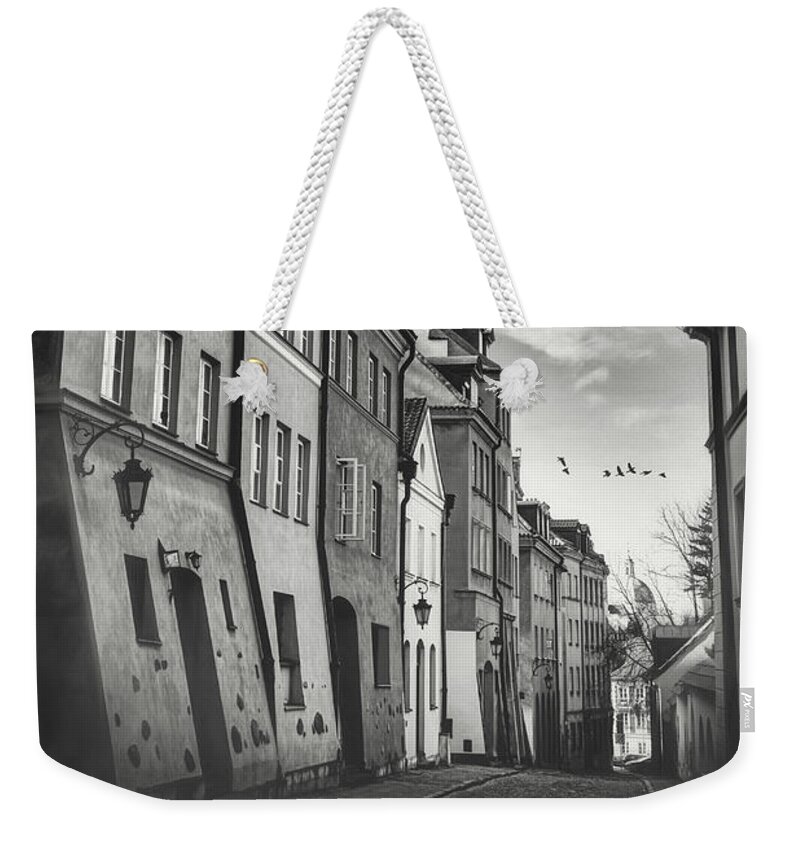 Warsaw Weekender Tote Bag featuring the photograph Warsaw Poland Old World Charm Black and White by Carol Japp