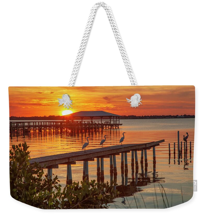 20425 Weekender Tote Bag featuring the photograph Watching the Sunset by Gordon Elwell