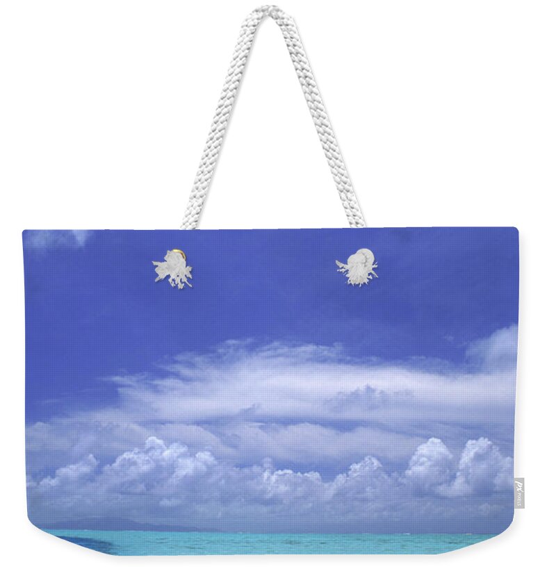 Tranquility Weekender Tote Bag featuring the photograph Water And Sky, Bora Bora, Pacific by Mitch Diamond