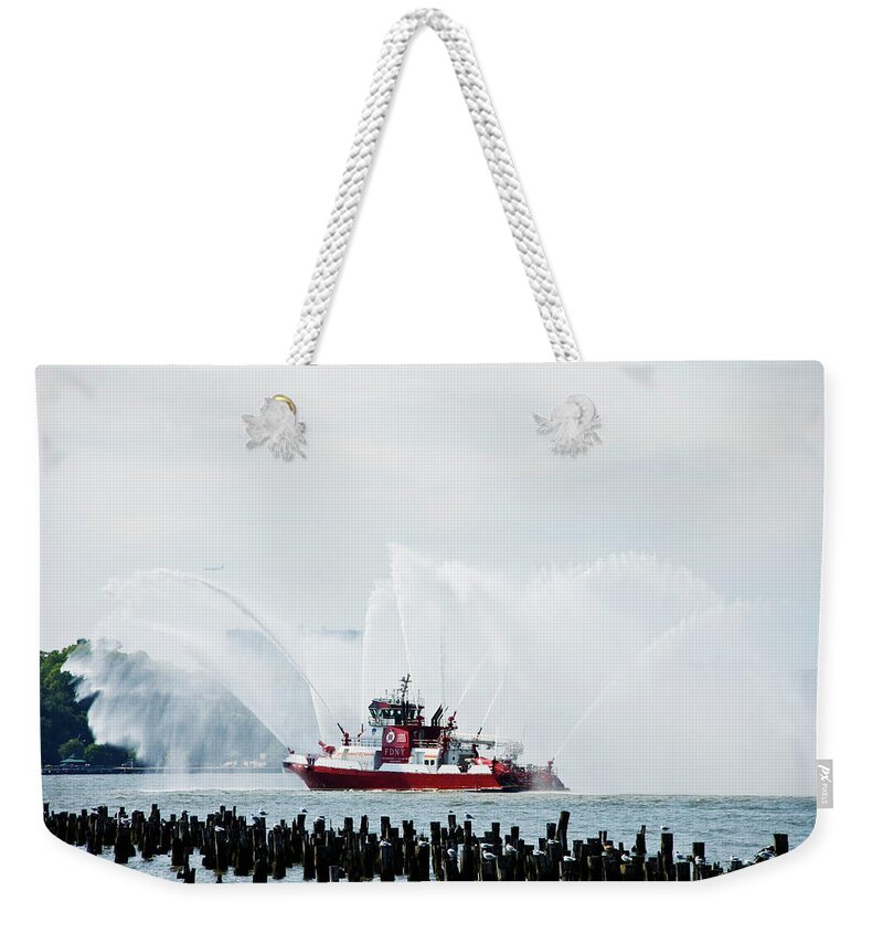 Fdny Weekender Tote Bag featuring the photograph Water Boat by Jose Rojas