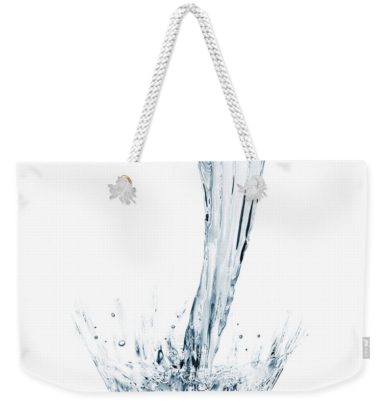 White Background Weekender Tote Bag featuring the photograph Water Pouring And Splashing On White by Burazin