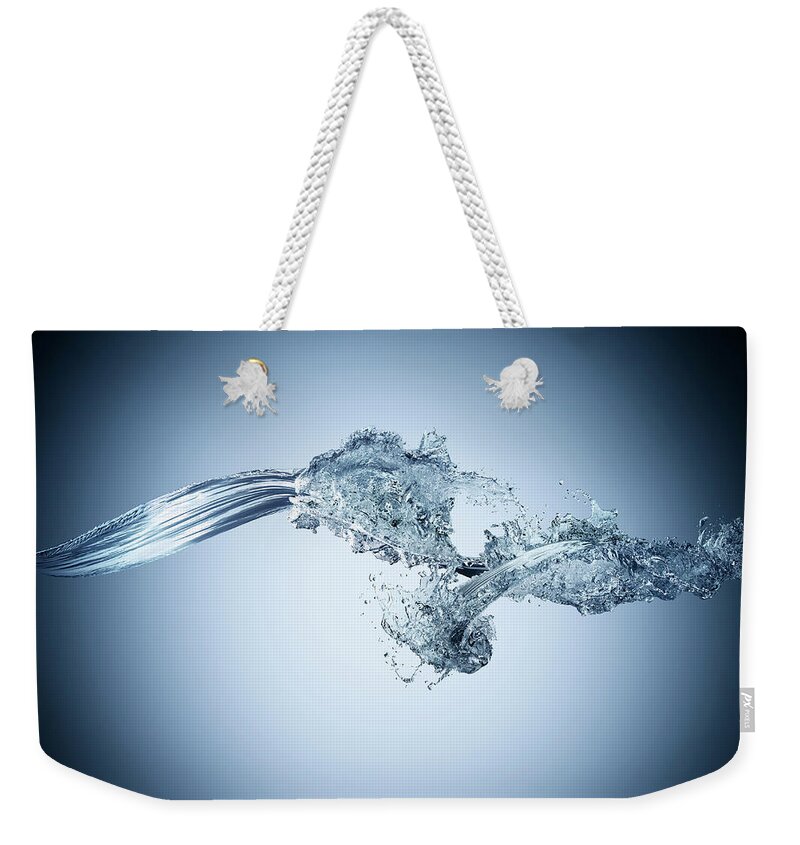 Mid-air Weekender Tote Bag featuring the photograph Water Splash Collision In Midair by Biwa Studio