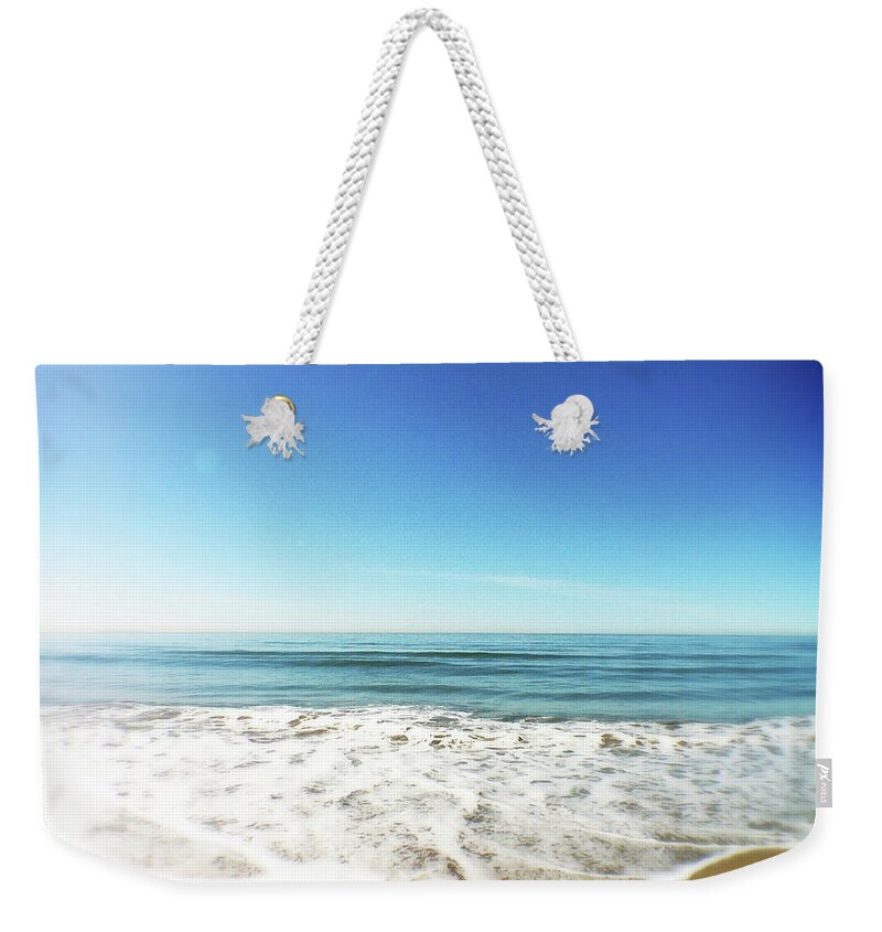 Water's Edge Weekender Tote Bag featuring the photograph Waves On Beach by Denise Taylor