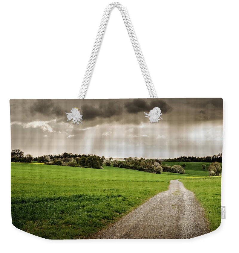 Scenics Weekender Tote Bag featuring the photograph Weather Of April by Photograph By Dr. Andreas Zachmann