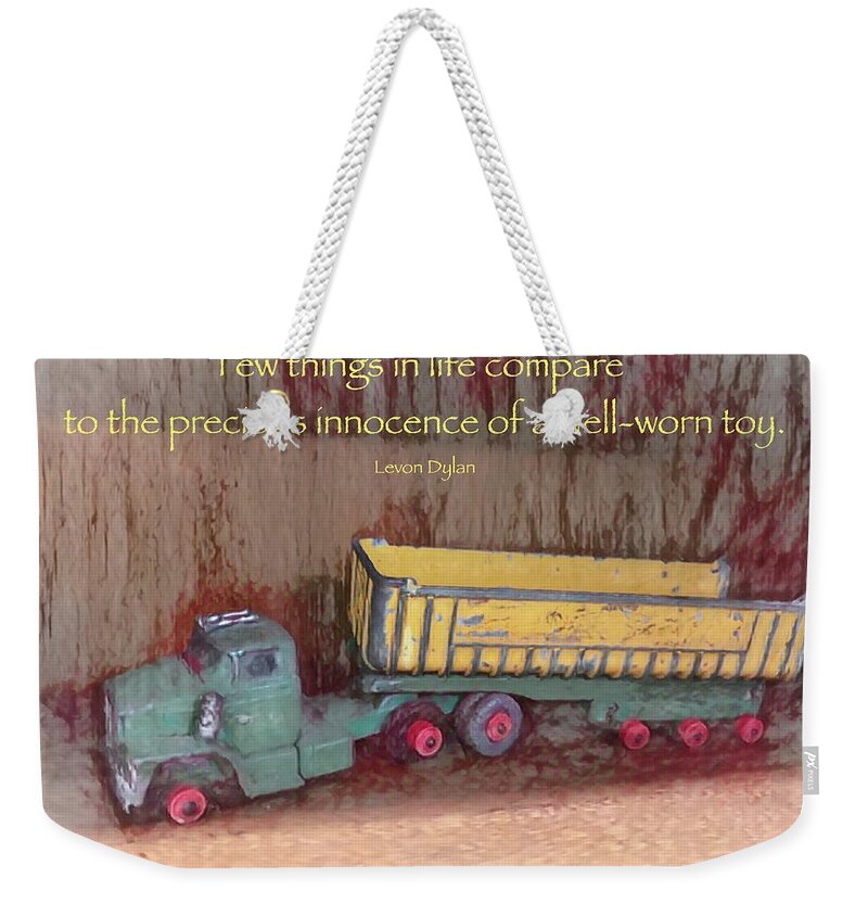 Toy Weekender Tote Bag featuring the photograph Well-Worn Toy by Jack Wilson