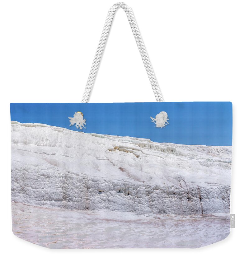 Turkey Weekender Tote Bag featuring the photograph Wet white limestone formations in Pamukkale by Sun Travels