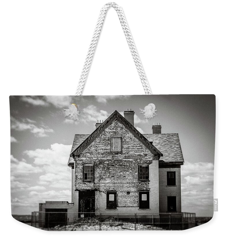Black And White Weekender Tote Bag featuring the photograph What Remains by Steve Stanger