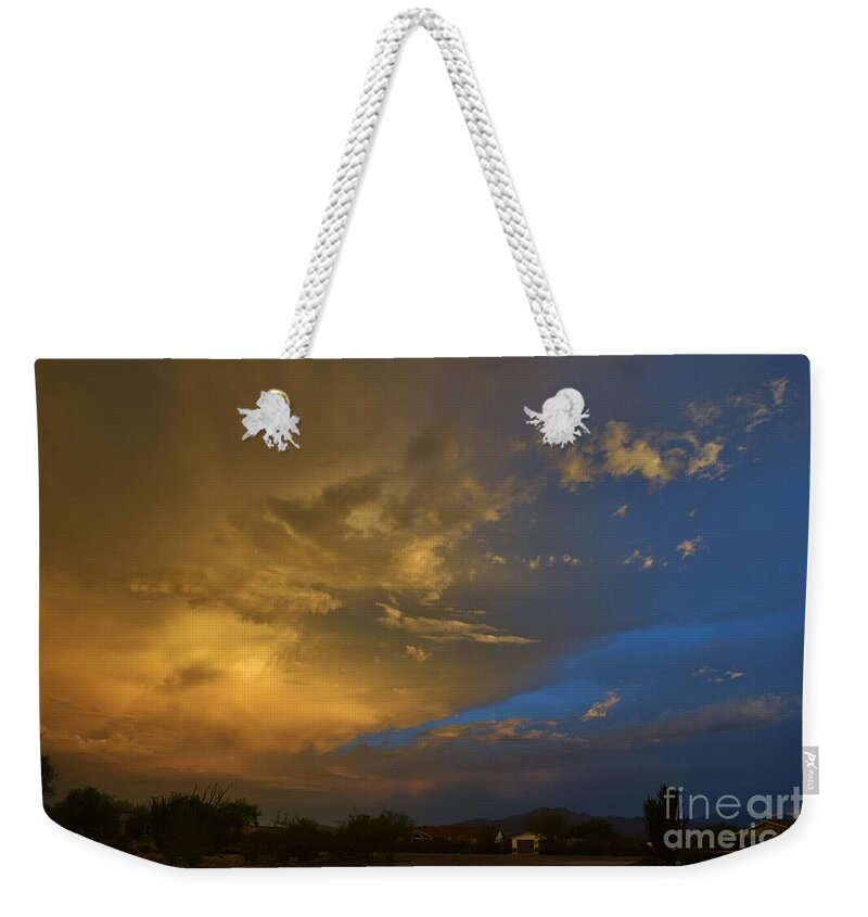 Sunset Weekender Tote Bag featuring the photograph What's Happening In The Sky by Janet Marie