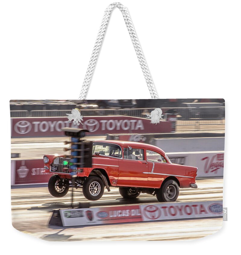 1955 Weekender Tote Bag featuring the photograph Wheels up 55 by Darrell Foster