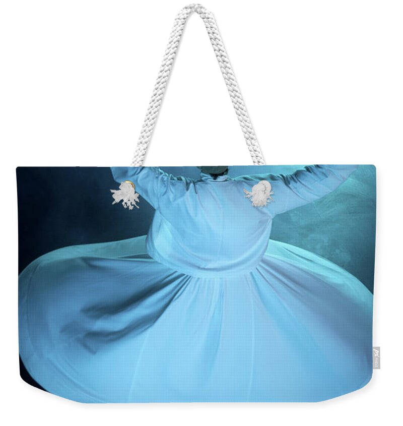 Istanbul Weekender Tote Bag featuring the photograph Whirling Dervish by Uchar