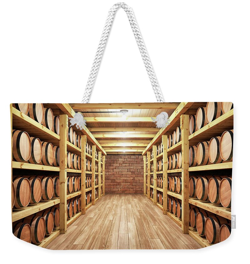 Fermenting Weekender Tote Bag featuring the photograph Whiskey Wine Cellar by Imaginima