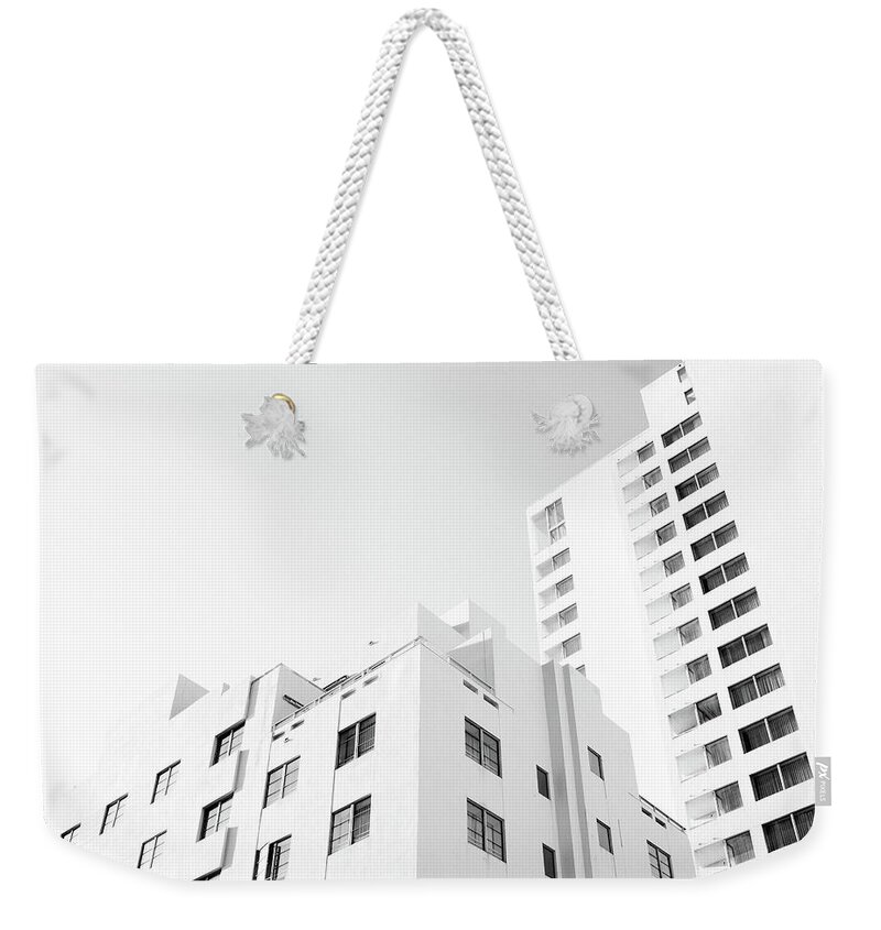 Apartment Weekender Tote Bag featuring the photograph White Condos by Moreiso