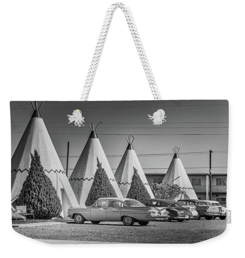 Holbrook Weekender Tote Bag featuring the photograph Wigwam Motel Park BW by Micah Offman