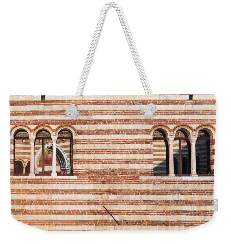 Arch Weekender Tote Bag featuring the photograph Window Of Palazzo Della Ragione, Verona by Deimagine